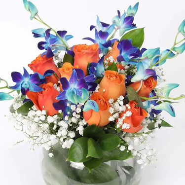 Orange Roses & Blue Orchids in fish Bowl